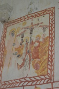 Crucifixion: le personnage agenouillé est probablement le donateur dont le patron est Saint Hubert évêque de Liège